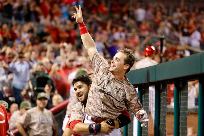 Gennett blasts four home runs as Reds rout St. Louis